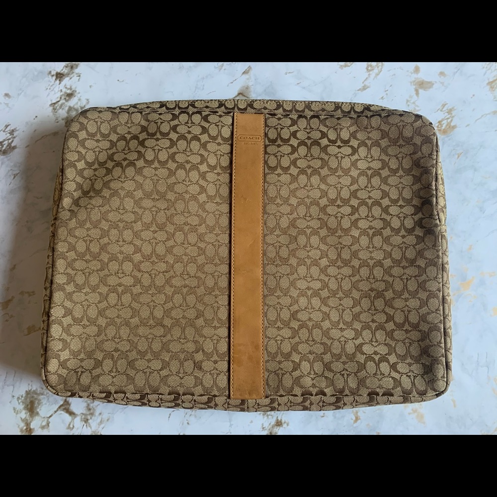 Coach laptop case fits a Mac book pro 13in or bigger